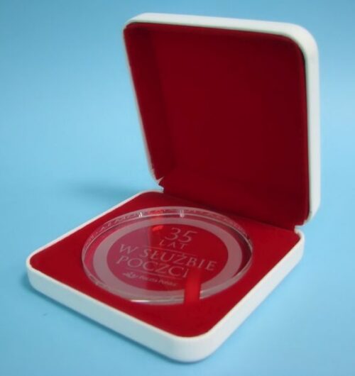 Kryształowy medal w indywidualnym opakowaniu