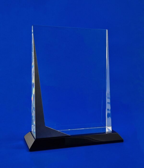 Glass award with metal on a black crystal base with 3D engraving A very impressive crystal award with a black crystal, decorated on the side with an original cut of 4 mm thick steel.